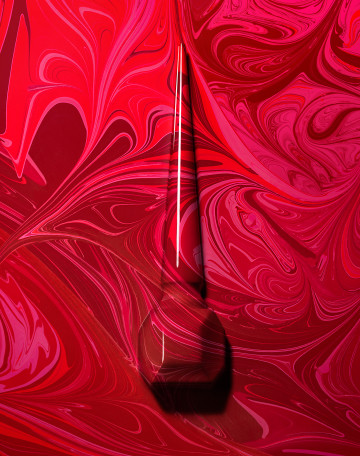 Louboutin Nail Marbled, cosmetic photography by Rich Begany